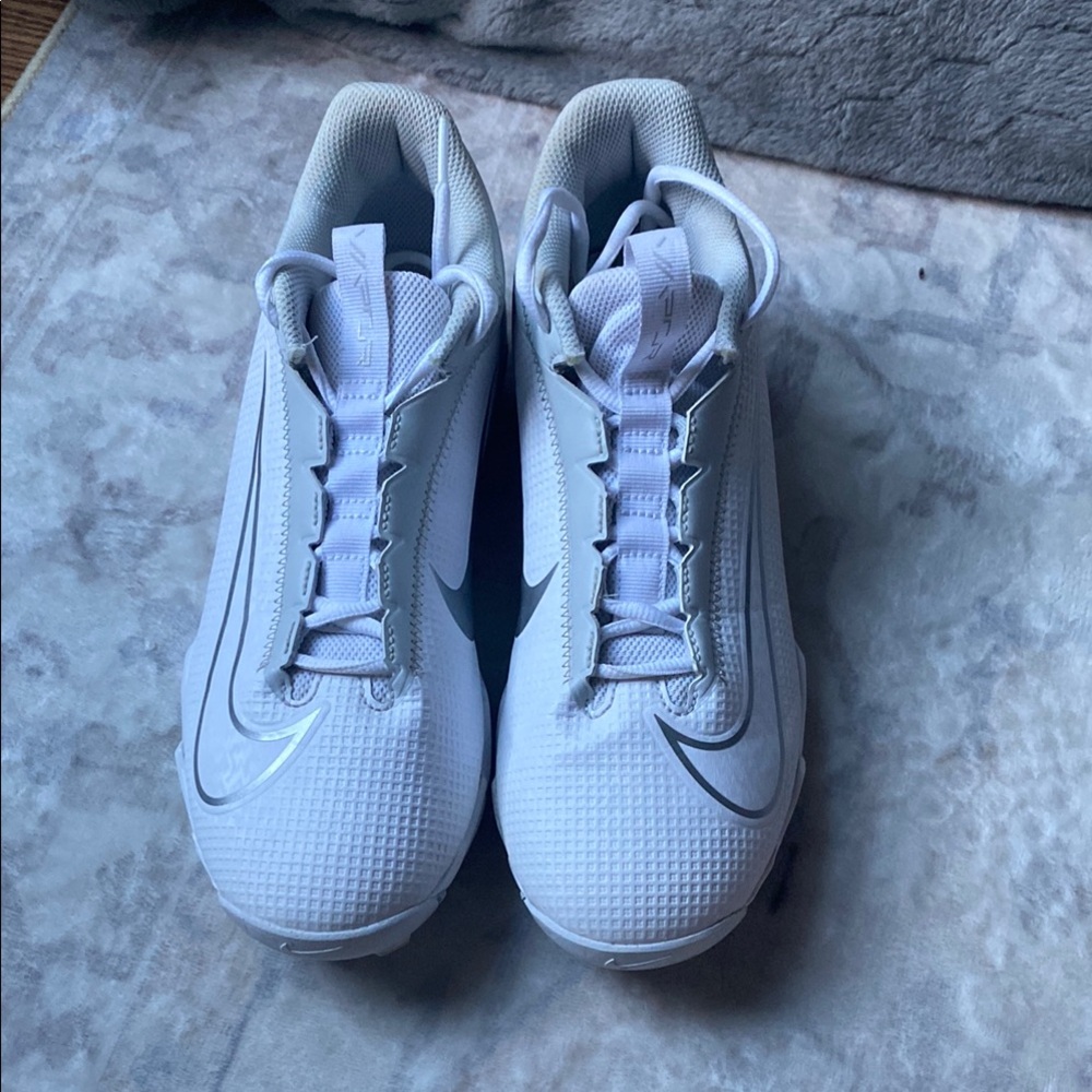 White and Gray Nike cleats